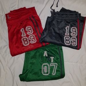 Athletic warm up pants...lot of 3